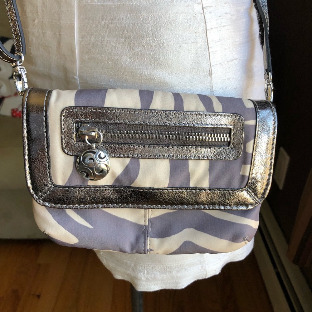 Zebra print fabric wristlet/ pouch.